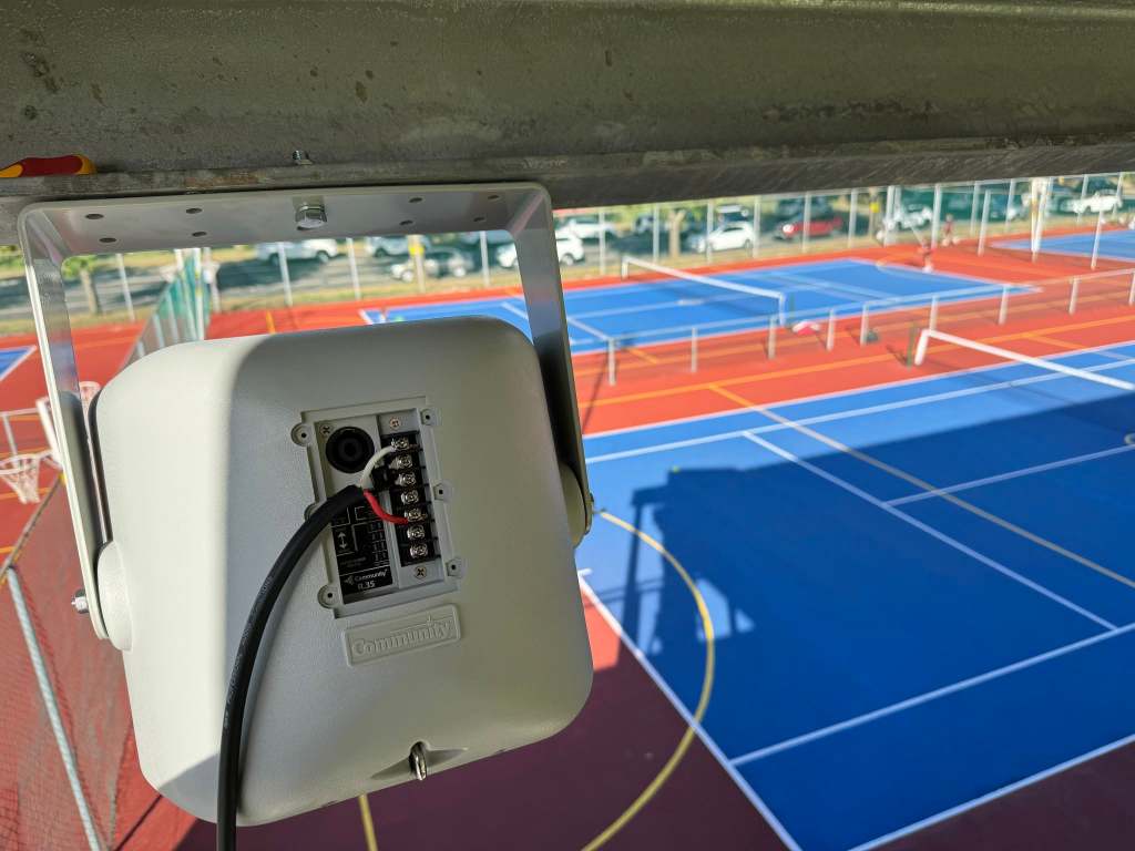 Weather-resistant outdoor loudspeaker installed for a sports facility