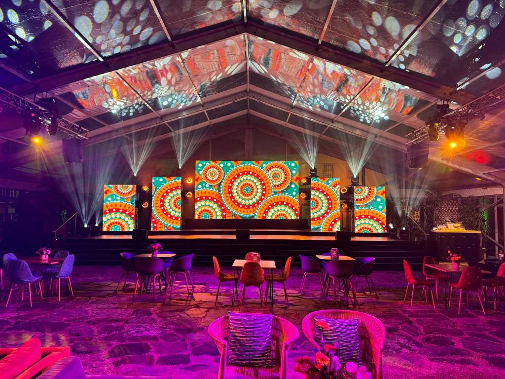 Event stage with large LED displays and lighting production by ExecuSound