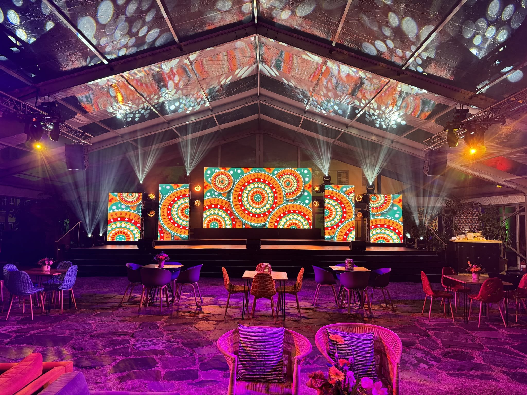 Event stage with large LED displays and lighting production by ExecuSound