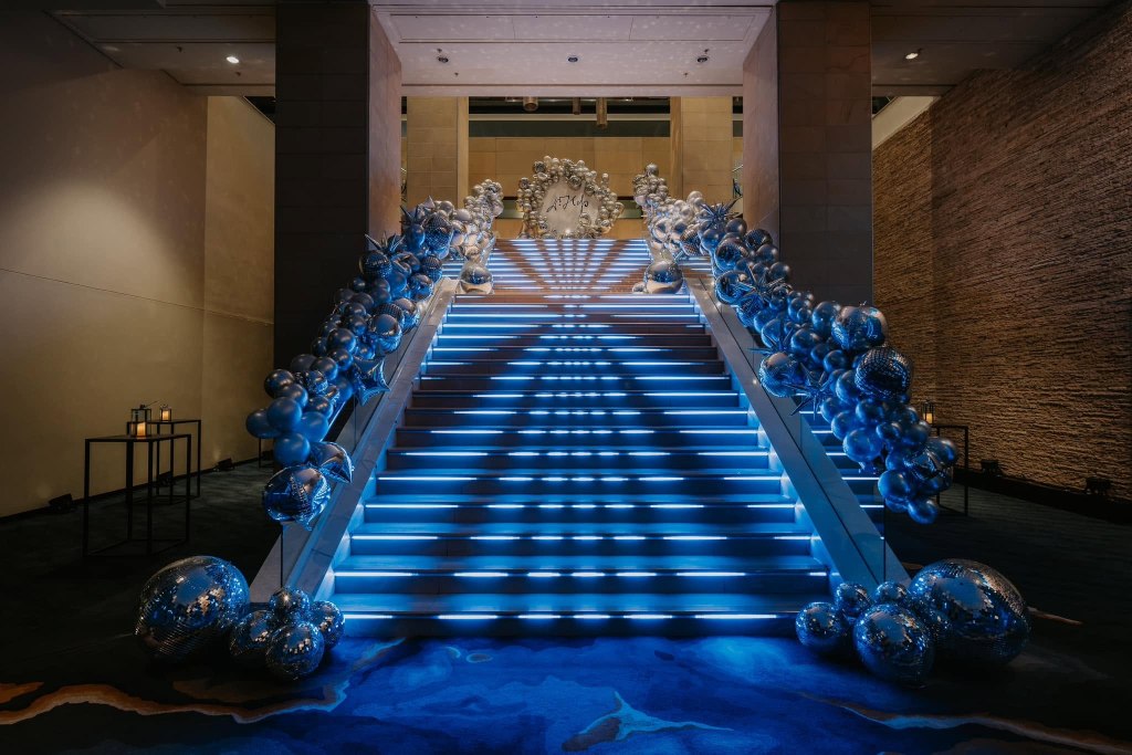 Decorative staircase lighting installation for an event